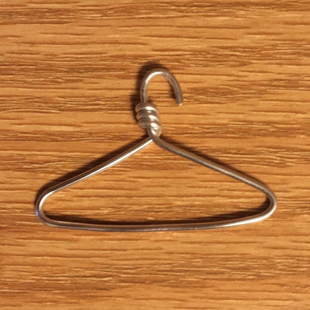 Pro-choice coat hanger necklace